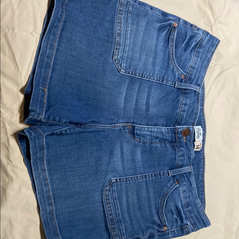 Women’s size 14 mid rise denim shorts.